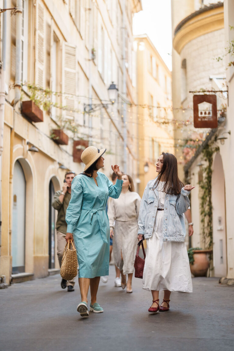 Happy guests exploring Nice Old Town during a guided food and wine tour